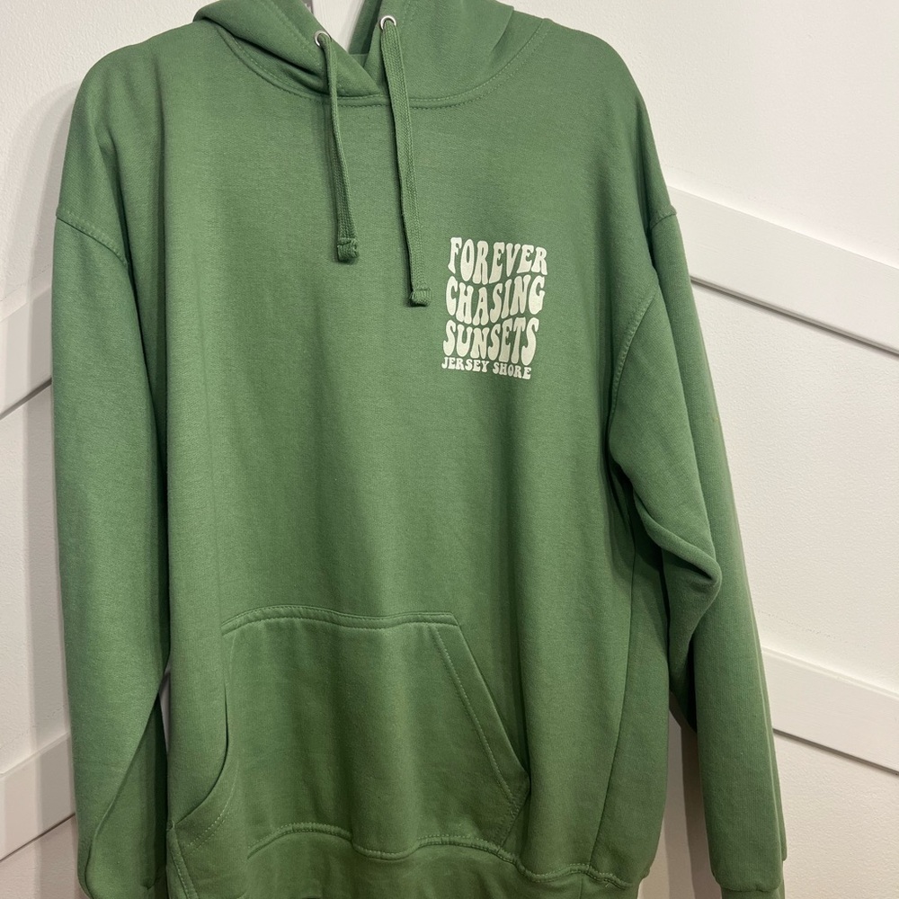 Chic Green Hoodie with Graphic Detail